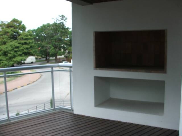 Terraza con parrillero